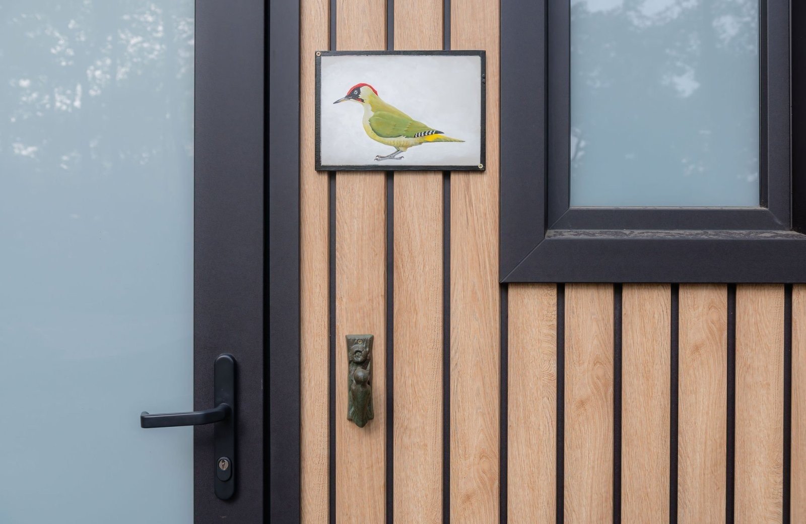 Buitenzijde van Lodge De Groene Specht, een luxe vakantiehuis in Nunspeet op de Veluwe